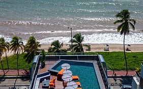 Acorde com o som do mar no Cabo Branco - flat com piscina aquecida e ar condicionado